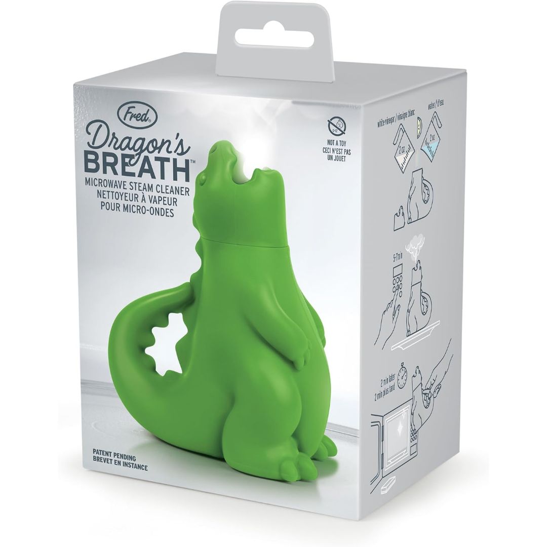 Dragon-shaped microwave steam cleaner in retail packaging with illustrated instructions for adding water and vinegar