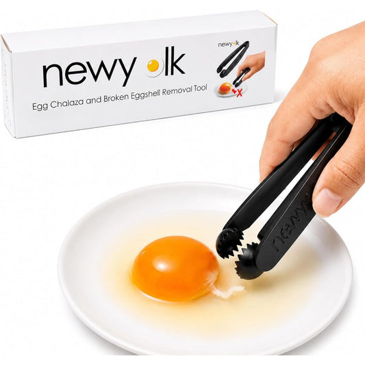 Black egg chalaza removal tool picking membrane from a raw egg yolk beside product packaging