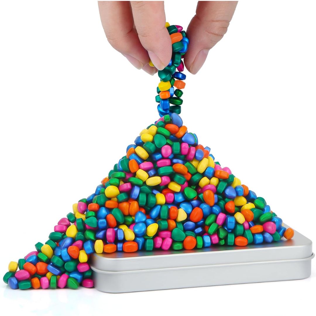 Colorful ferrite putty being stretched over a metallic container on a white background