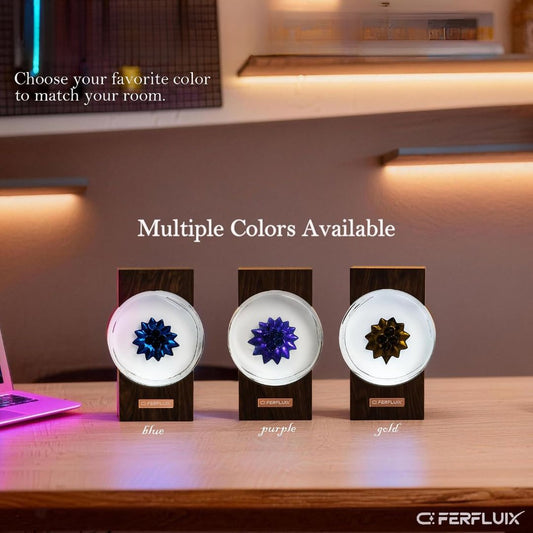 Ferrofluid music rhythm lamp displaying blue, purple and gold magnetic fluid patterns in circular glass chambers on wooden bases