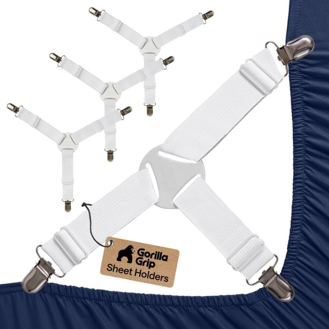Set of four white Gorilla Grip fitted sheet holders with adjustable elastic straps and metal corner clips