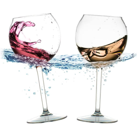 Two floating shatterproof wine glasses filled with red and white wine on a white background