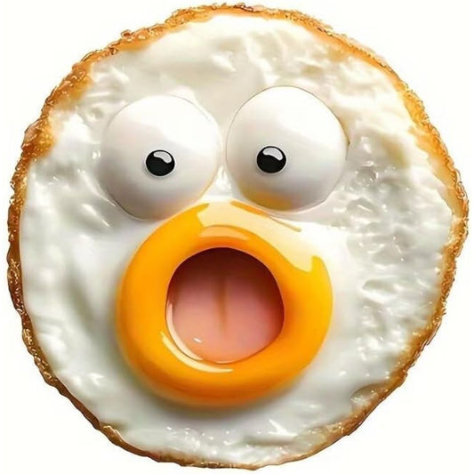 A funny egg shaped fridge magnet with eyes, mouth and a shocked expression.