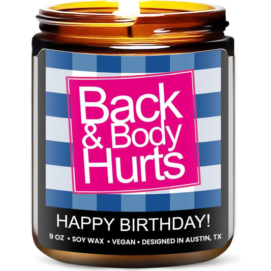 A candle with funny text reading, 'Back & Body Hurts. Happy Birthday' on a white background