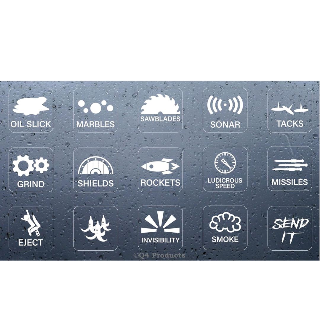A dark gray rectangular panel of decal cat stickers with a water-droplet finish, featuring 12 white outlined decals or markings labeled with military evasion/stealth terms such as Oil Slick, Marbles, Sawblades, Sonar, Tacks, Grind, Shields, Rockets, Ludicrous Speed, Missiles, Inject, Invisibility, Smoke, and Send It.
