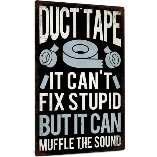 A rectangular decorative sign with a distressed dark brown background and printed slogan reading 'DUCT TAPE IT CAN'T FIX STUPID BUT IT CAN MUFFLE THE SOUND' in white and light blue text, with tape illustrations.