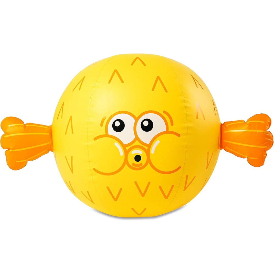 A bright yellow inflatable beach ball shaped like a puffer fish on a white background