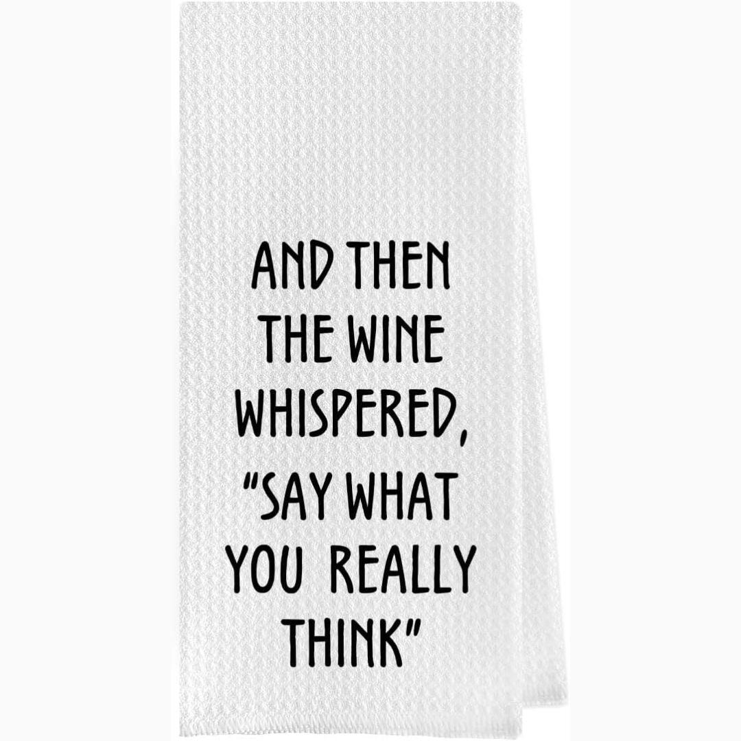 White towel with black text quote on a white background