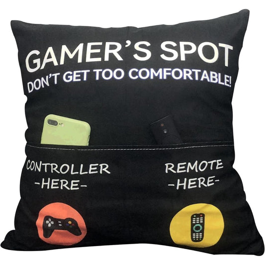 Black pillow with text and pockets labeled 'Controller Here' and 'Remote Here', featuring gaming-themed design.