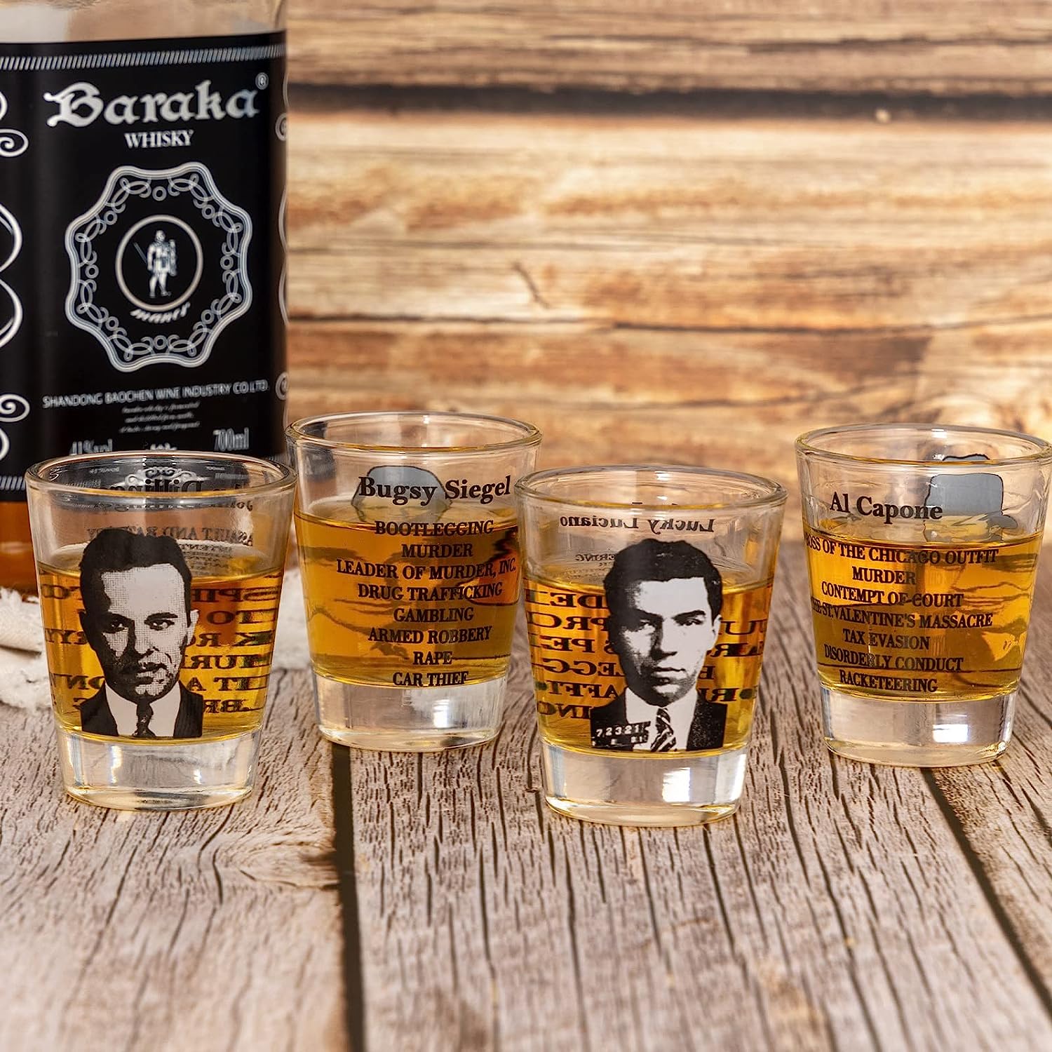 Set of shot glasses inspired by classic gangster culture. Each shot glass features a unique design, reminiscent of iconic elements from gangster movies. The set includes multiple shot glasses, each with its own distinctive graphic.