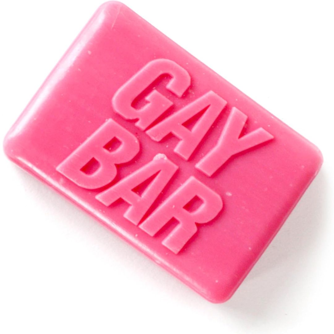 Pink bar of soap with 'GAY BAR' text on a white background