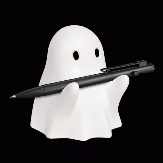 Ghost-shaped pen holder with a black pen on a transparent background