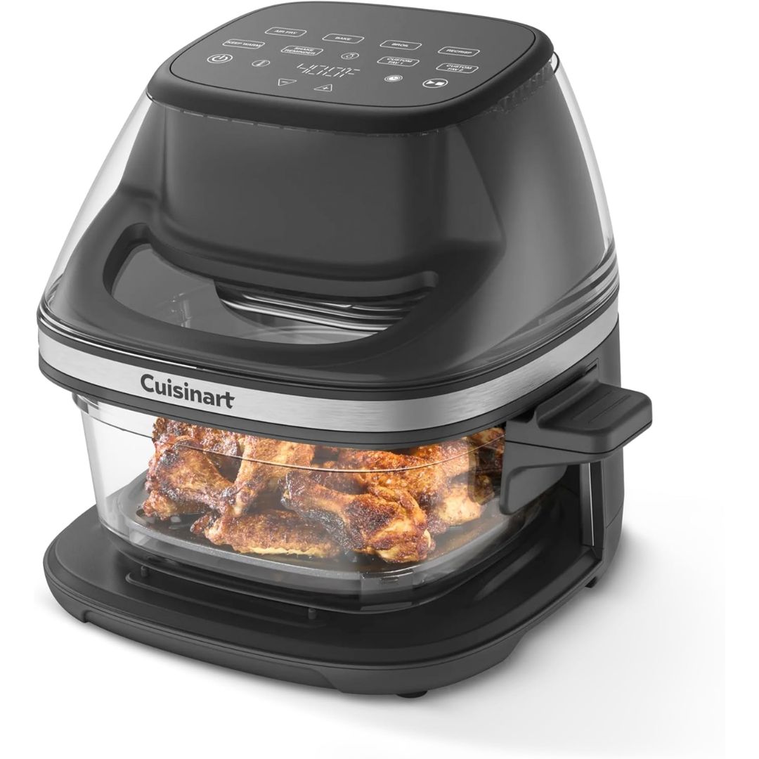 Cuisinart air fryer in black with a clear glass basket containing cooked chicken wings, shown on a white background.