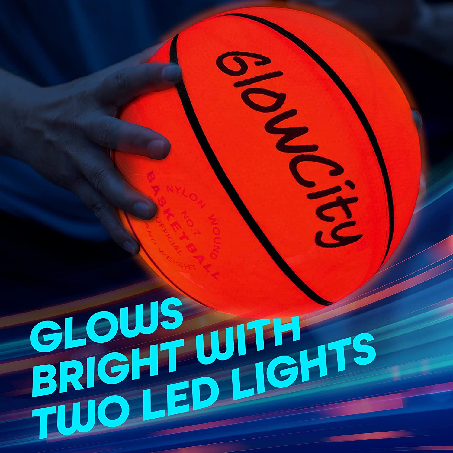 A close-up view of a Glowcity glow in the dark basketball which is lit up.