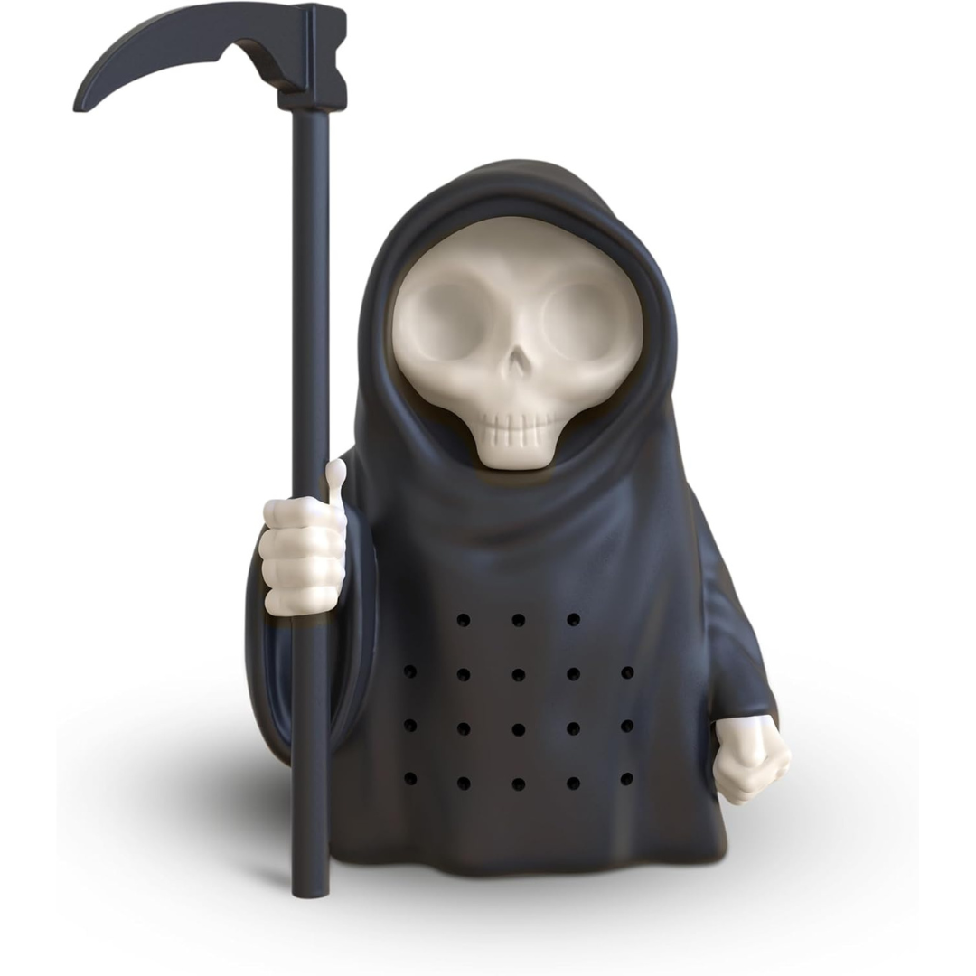 A black silicone tea infuser shaped like the Grim Reaper, holding a scythe, with a perforated body for steeping tea and a skeletal face under a hood.
