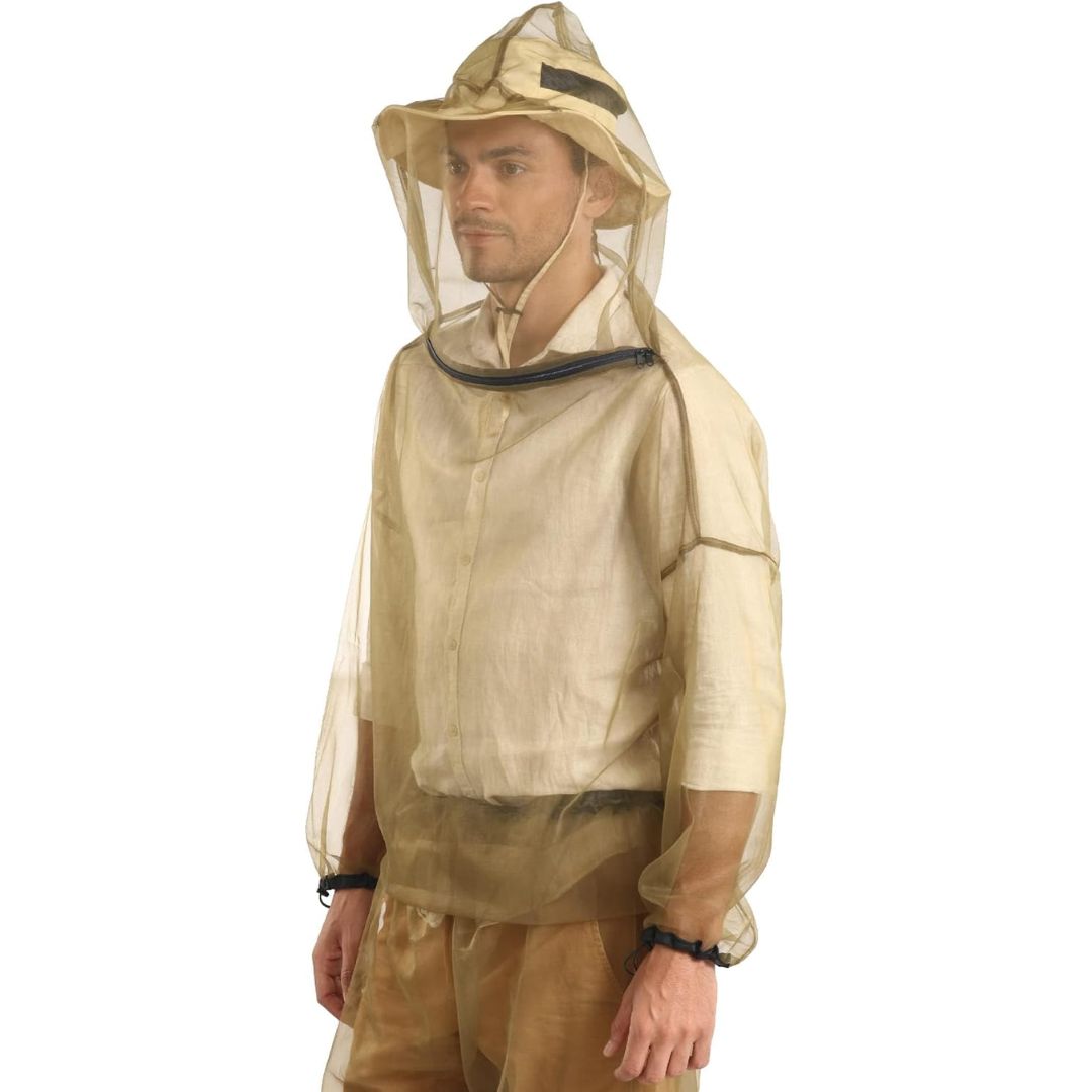 A man wearing a light beige mosquito net suit with a mesh hood, veil, and protective jacket, shown against a plain white background.
