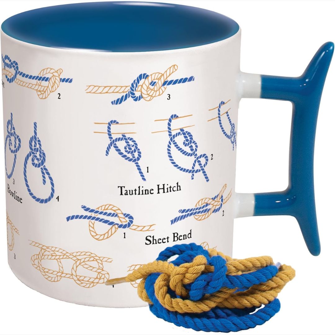 A white and blue coffee mug with with tutorials printed on it for how to tie various knots.
