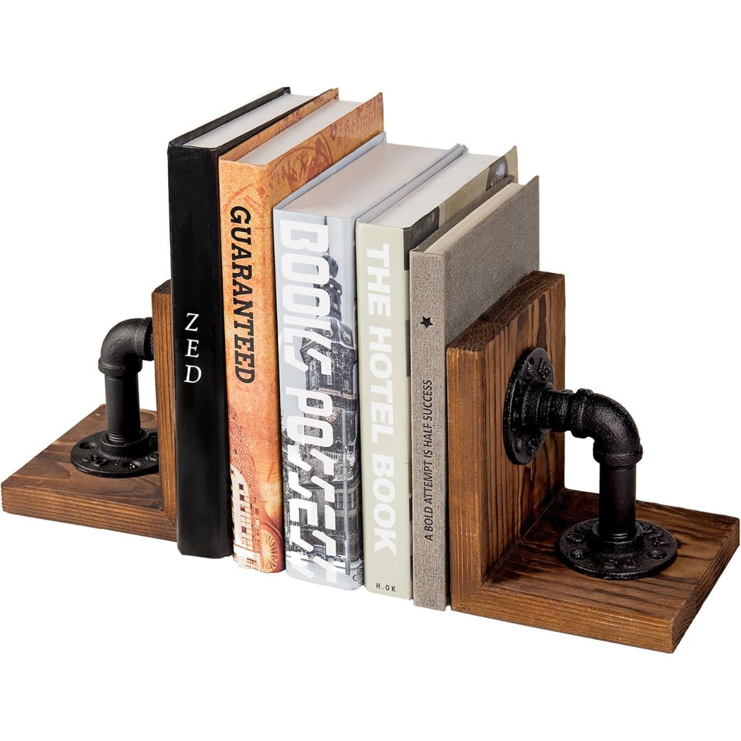 Wooden bookends with industrial-style pipes holding books on a white background