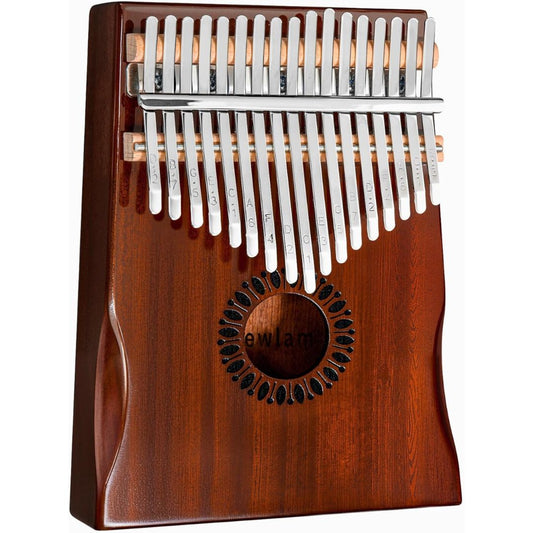 Wooden kalimba with metal tines on a white background