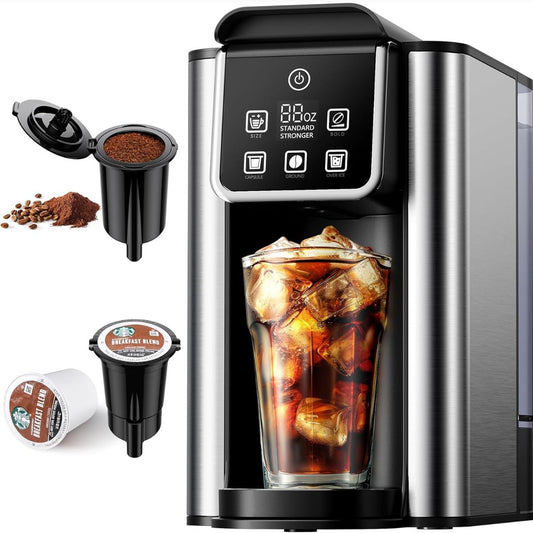 Coffee machine with a glass of iced coffee, coffee pods, and a container of coffee grounds on a white background.