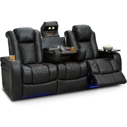 Black leather home theater recliner sofa with two extended seats, quilted diamond-patterned upholstery, built-in headrest screens, built-in side tables with trays, and blue LED underglow, shown on a white background.