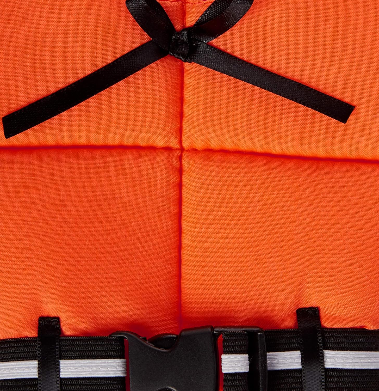 Close-up of orange life vest-style wine bottle cover, showing black ribbon bow and black buckle strap with white reflective stripe.