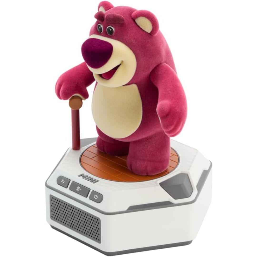 Plush robotic pink toy bear on an electronic display stand with buttons