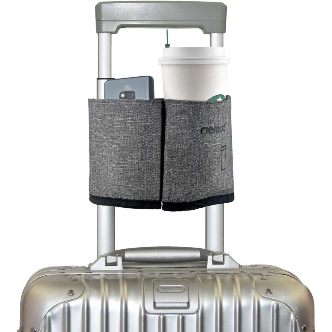 A airport travel luggage cup holder travewl drink carrier attached to the handle of a suitcase holding a Starbucks coffee and a cell phone