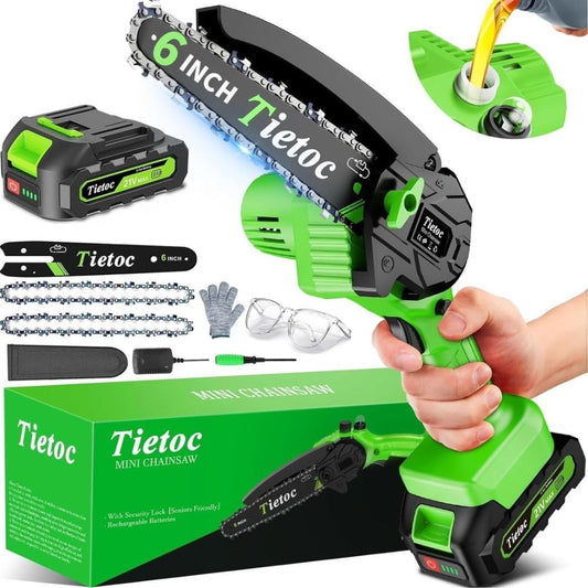 6 inch Tietoc green mini electric chainsaw with box contents on a white background.