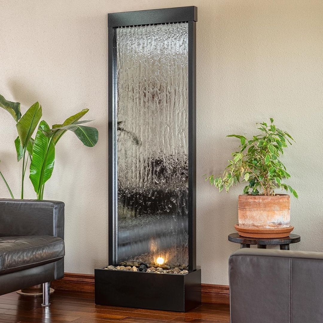 Tall mirror waterfall fountain in a living room
