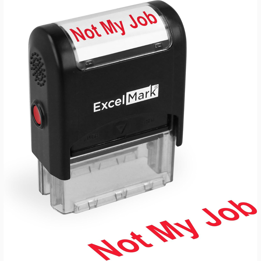 Black self-inking office stamp printing the words Not My Job in red