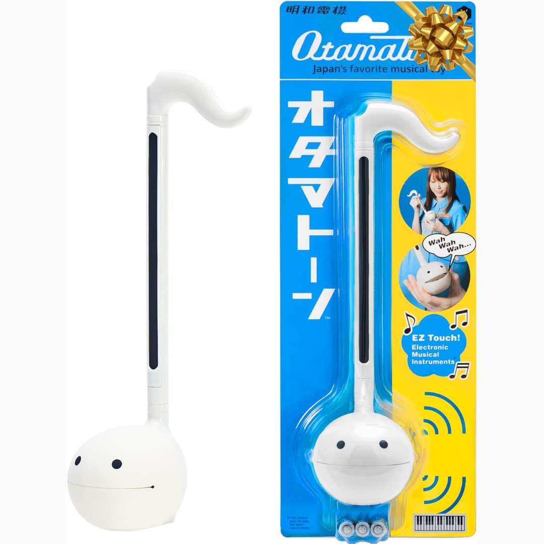 White musical instrument with packaging featuring 'Otamatoo' branding on a white background