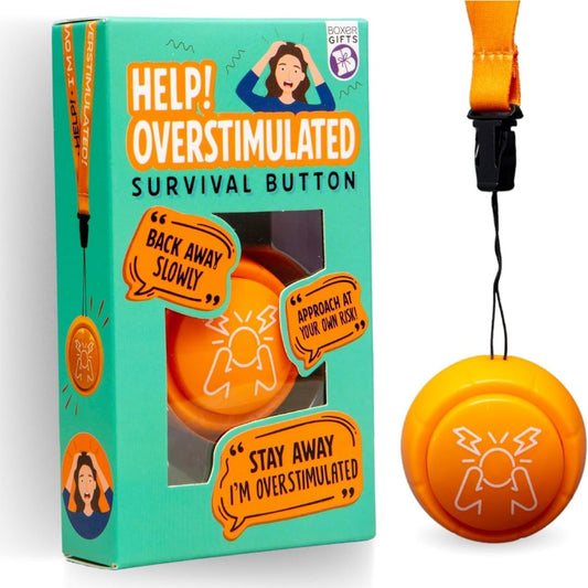 The 'Help! Overstimulated Survival Button' by Saves Gifts, shown with its teal packaging box and the orange button accessory with an orange lanyard strap.