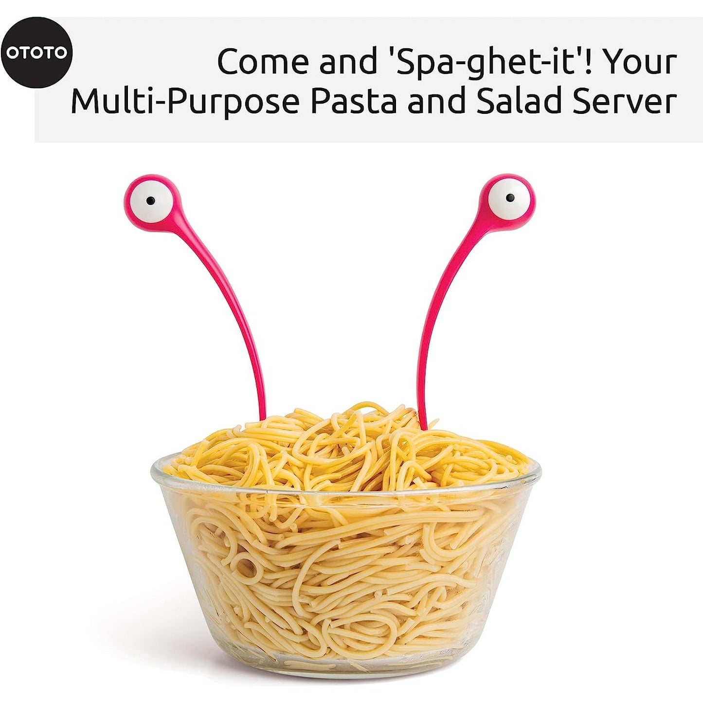 A pair of monster-looking salad and pasta scoopers are resting in a bowl of pasta.