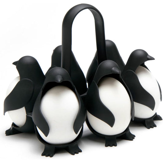 Egg cooker shaped like penguins holding eggs on a white background