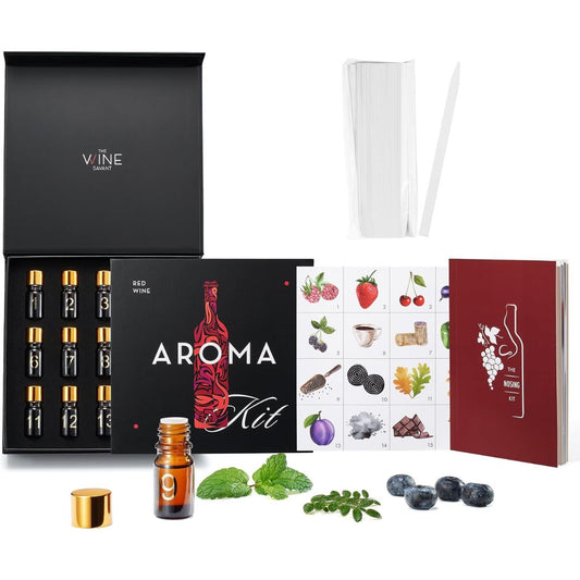 Red wine aroma training kit with scent bottles, aroma reference chart, guidebook and paper testing strips on a white background.