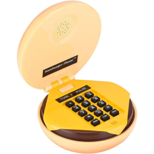 A toy hamburger phone with a yellow cheese slice dial pad, black buttons, and a peach-colored plastic outer bun shell, shown open on a white background.