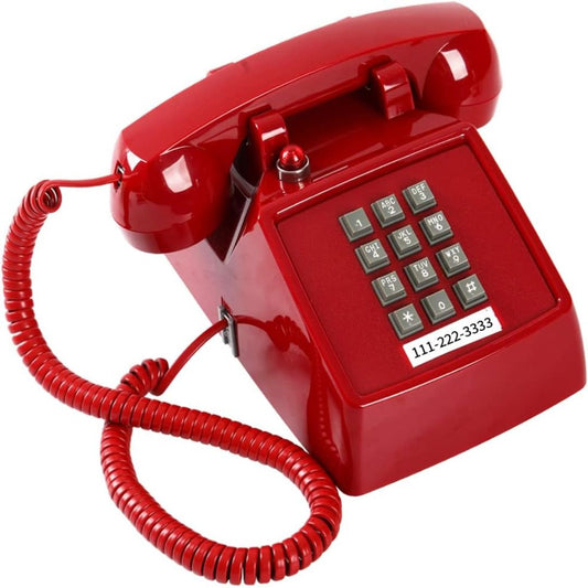 A glossy red retro-style telephone with a matching red coiled cord, numeric keypad, and a printed phone number on the front, shown on a plain white background.