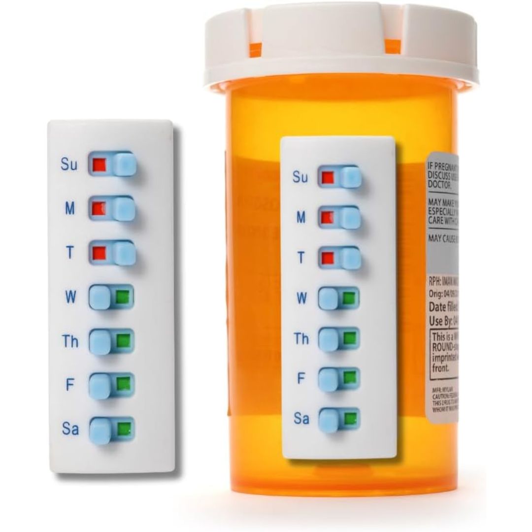 An orange prescription pill bottle with a white cap and a white weekly reminder card attached, shown next to a matching standalone reminder card on a white background.