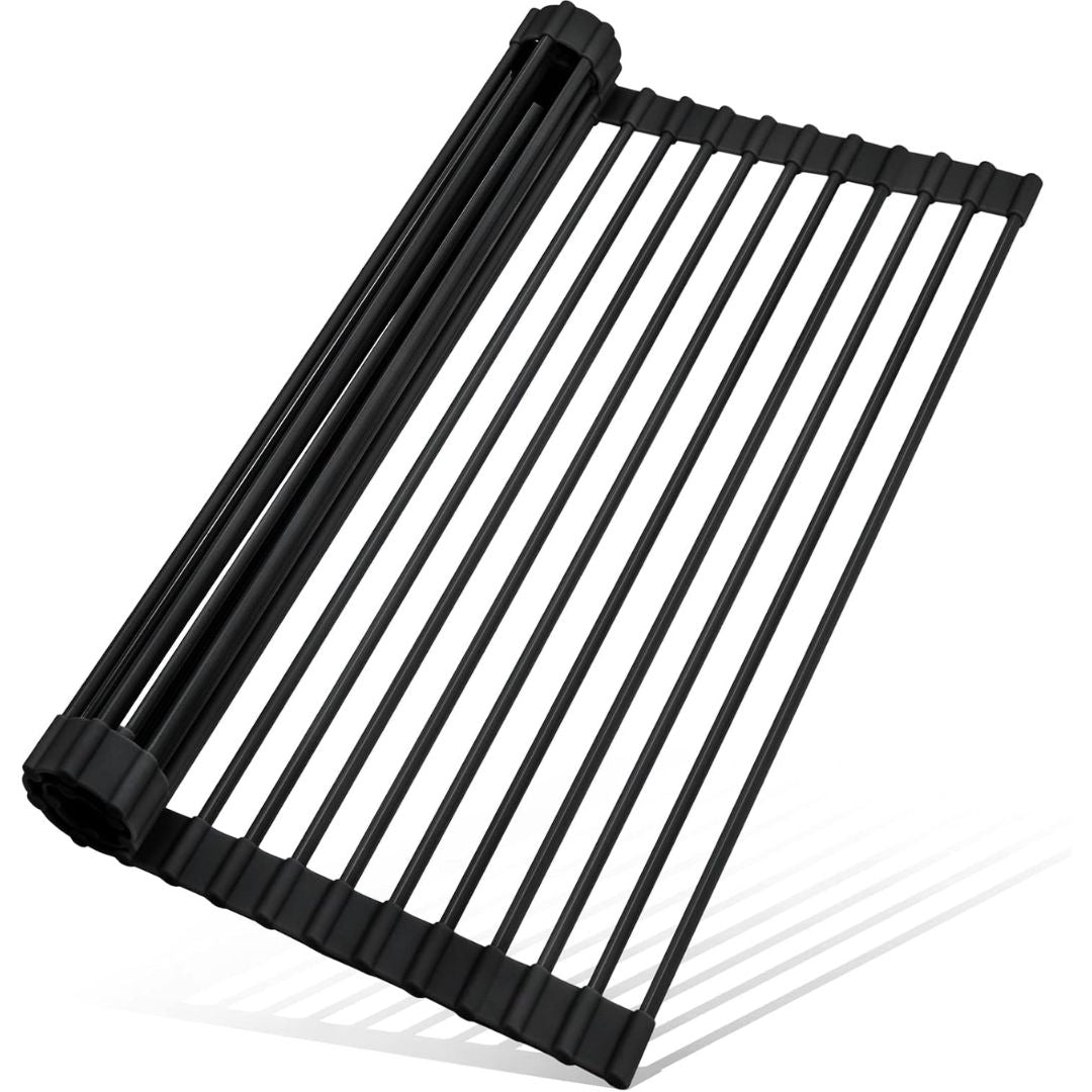 Black roll-up over-sink drying rack partially rolled up on a white background.