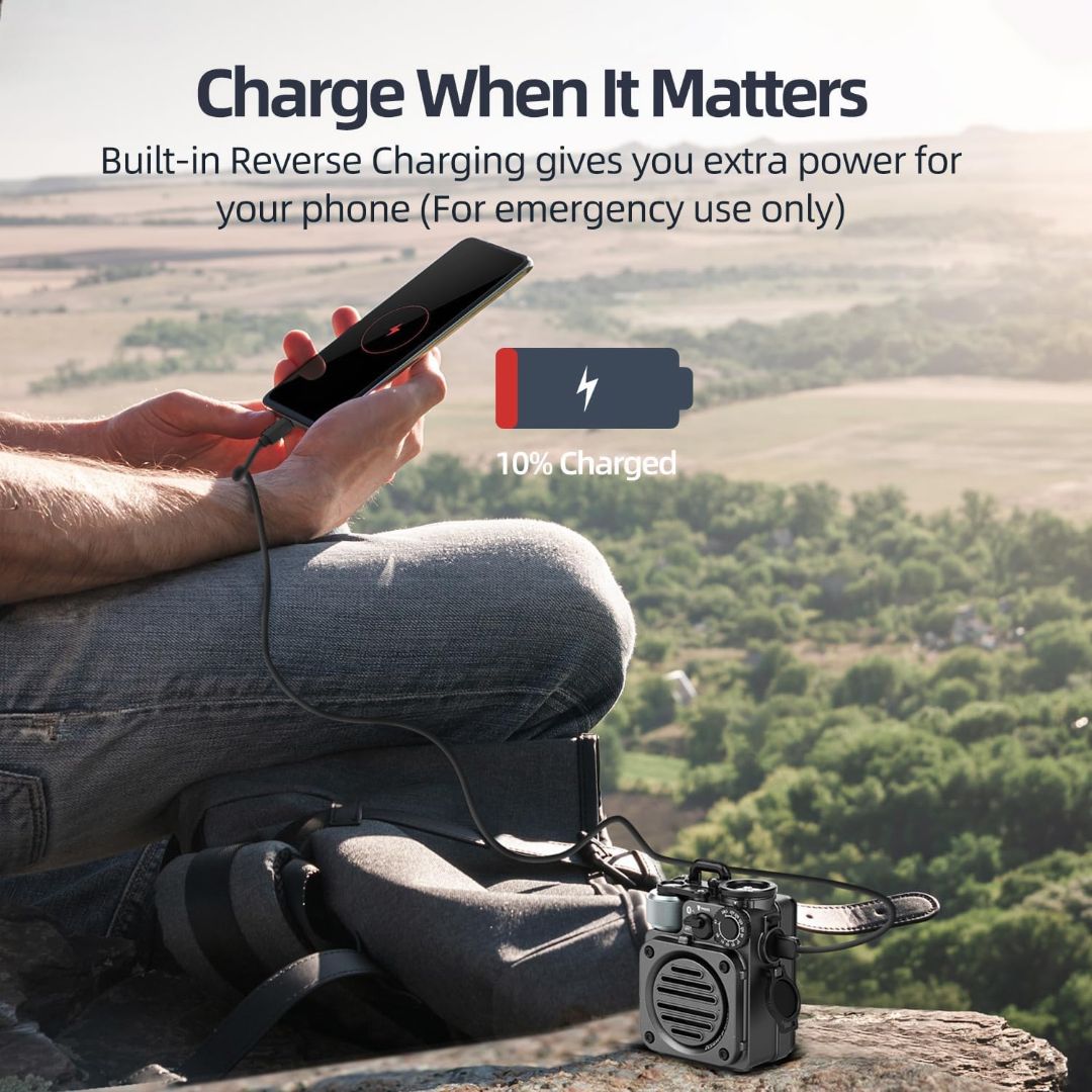 Portable outdoor Bluetooth speaker charging a smartphone during a hiking trip using its built-in reverse charging function