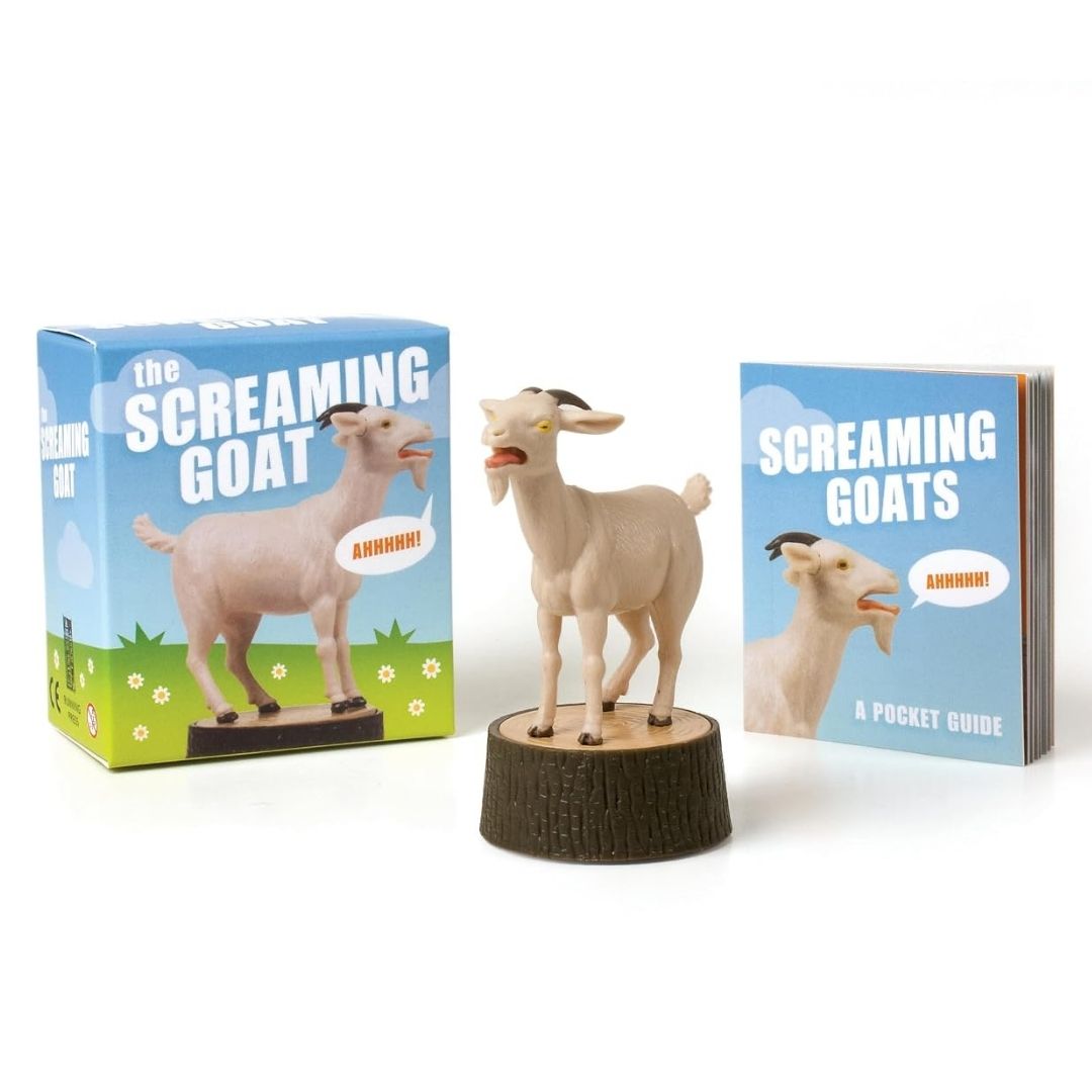 The Screaming Goat figurine with box and book.