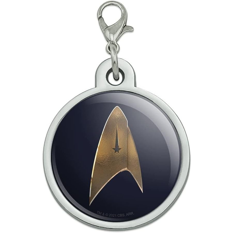 A silver dog tag shaped like the Star Trek Discovery Delta Shield.