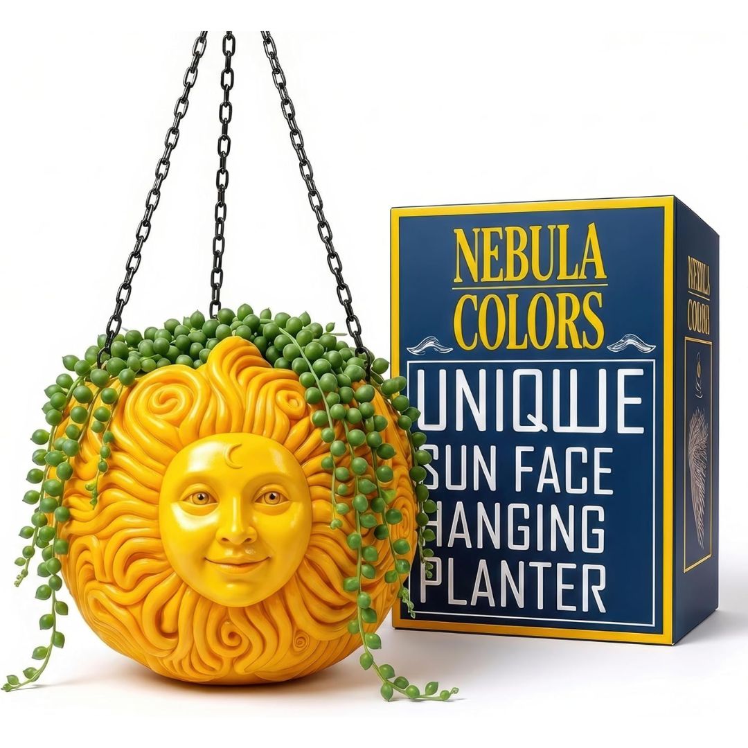 A yellow hanging planter shaped like a sun face with trailing green plant stems, shown next to its navy and yellow retail box labeled 'Nebula Colors Unique Sun Face Hanging Planter' on a white background.