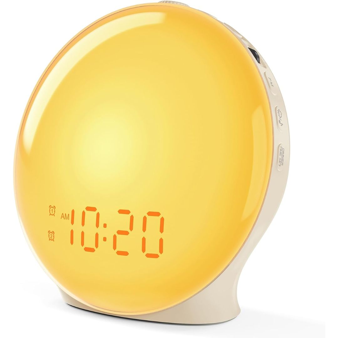 A round sunrise digital alarm clock with a glowing yellow face and an orange LED display showing 10:20, set against a plain white background.