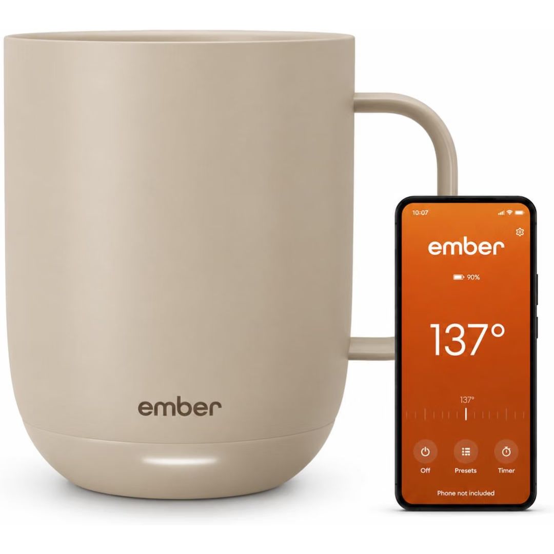 A temperature controlled smart heated mug with app on white background