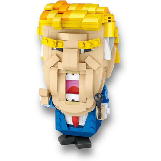 LEGO-like character head of Donald Trump with yellow hair, blue shirt, and red tongue on a white background