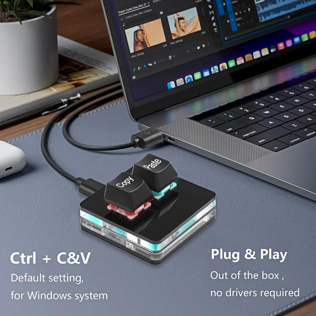 Two-key copy and paste keyboard connected to a laptop for quick Ctrl+C and Ctrl+V shortcuts