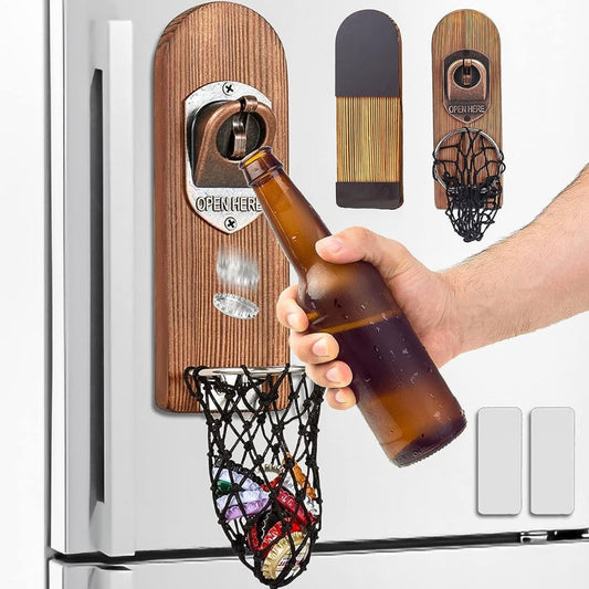 A hand opening a beer using a wooden wall mounted beer bottle cap opener with basket underneath to catch the lid.