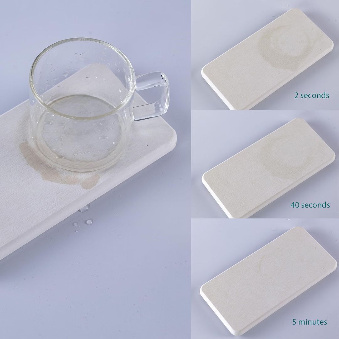 Water absorbing drying trays showing how a glass watermark is absorbed into the stone.